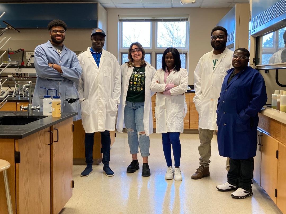 Pictured with Dr. Agbogun (second from right) are FHSU Geosciences Graduate students Oluwaseun Omoyemi and Olumide Ajulo and Tabor college students participating in water grant-related lab research.