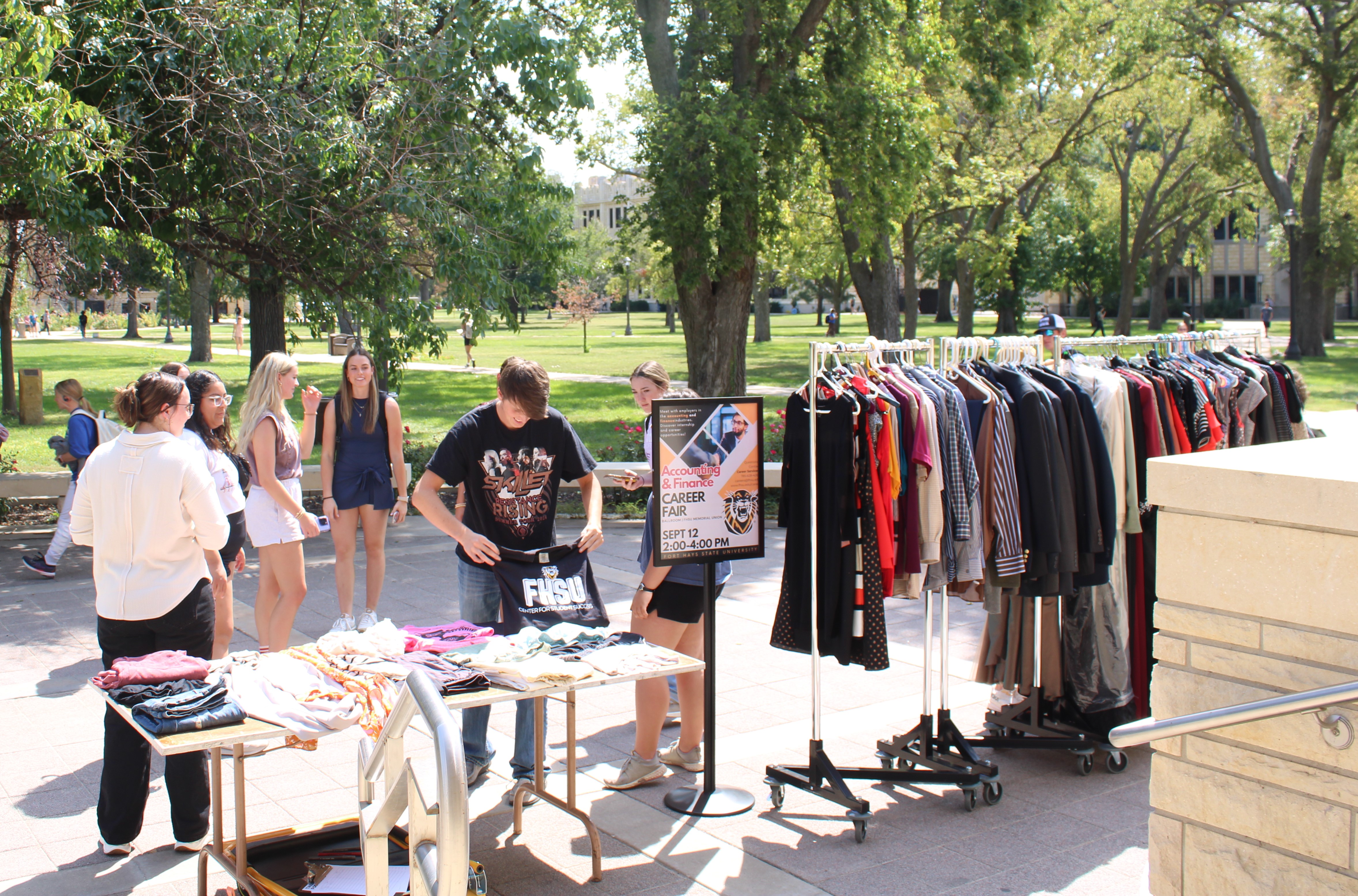 FHSU students shop the SGA Green Event clothing swap on Tuesday on the university’s quad.